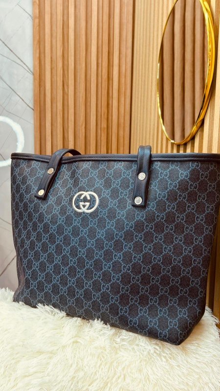 شنطة غوتشي الكبيرة